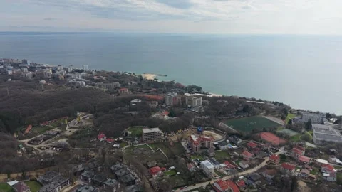 Drone Camera Flying Above Seaside Residential Area And Coastal Urban Landscape Stock Footage 332773427