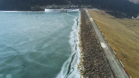 Drone camera flying over artificial lake Stock Footage 149357353