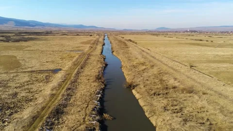 Drone camera flying over dirty Olt river Stock Footage 149927523