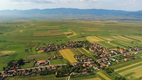 Drone camera flying over a small hungarian village in Romania Stock Footage 159286325