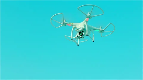 Drone with camera flying in the sky Stock Footage 63605112