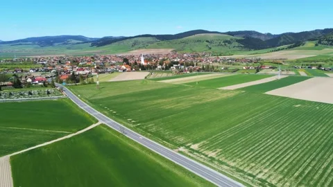 Drone camera flying towards a hungarian village in Transylvania Stock Footage 153803745