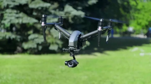 Drone with Camera on Gimbal flying in the Sky Stock Footage 92351584