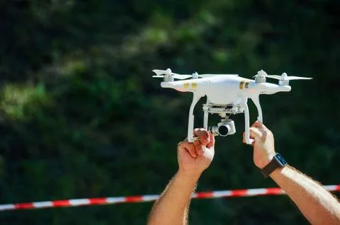 Drone with camera in mans hands Stock Photos