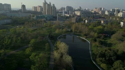Drone camera rises over the lake in Victory Park Stock Footage 74913941