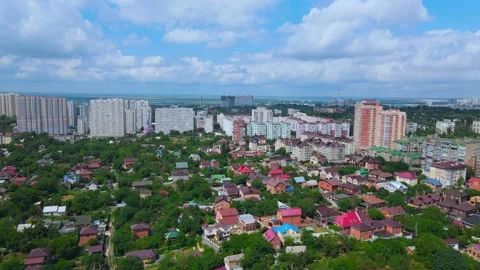 Drone with camera slowly flies over residential area with high-rise buildings Stock Footage 160376048