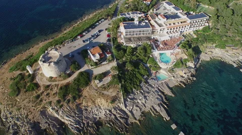 Drone camera tilting above peninsula with lighthouse Vídeo Stock 59832302