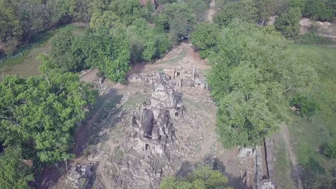 Drone camera tilting down on temple ruins.  Stock Footage 128166095