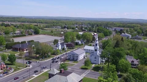 Drone Camera Tilts Down At Hadley Town Hall &amp; Church Stock Footage 330121929