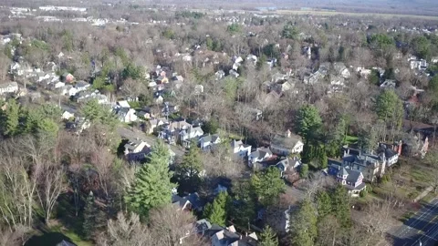 A Drone Camera Tilts Down At A Residential Neighborhood Stock Footage 329773750