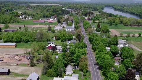 A Drone Camera Tilts Down At A Small New England Town. Stock Footage 329901450