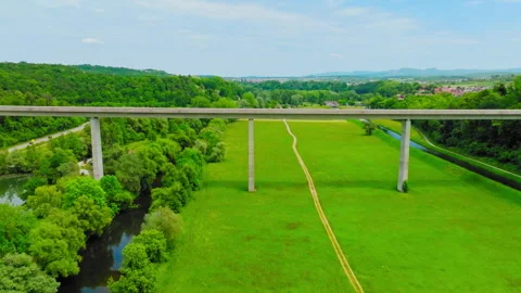 Drone Capture of Bridge Above Forest and Valley 動画素材 315498676