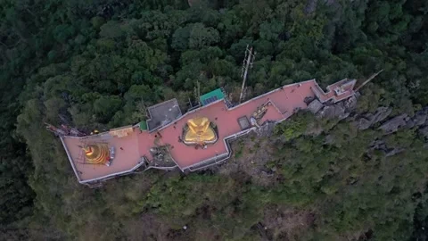 Drone capture of Buddha statue and temple on rocky hill, Thailand Vídeos de archivo 309798905