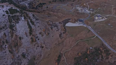 Drone capture of Gardena Pass road in morning light, Dolomites, Italy Stock Footage 321551389