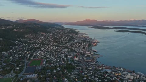 Drone capture of Molde city glowing under sunset skies, Norway Stock Footage 320731659