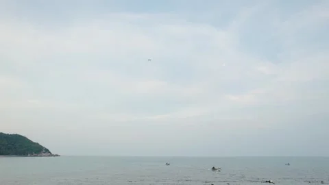 Drone capture a plane in the ocean, on beach Koh Phangan, Thailand Stock Footage 277412778