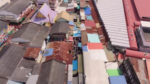 Drone capture of Talad Rom Hub with market and train tracks, Thailand Stock Footage 304441208