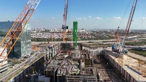A drone-captured aerial view of a construction site Stock Footage 295504659