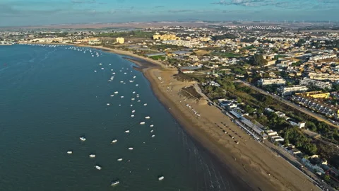 Drone captured sunset over Sanlucar de Barrameda, Andalusia. Spain. Stock Footage 262097874