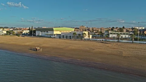 Drone captured sunset over Sanlucar de Barrameda, Andalusia. Spain. Stock Footage 262097893