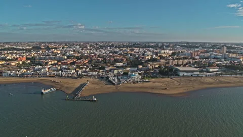 Drone captured sunset over Sanlucar de Barrameda, Andalusia. Spain. Stock Footage 262098034