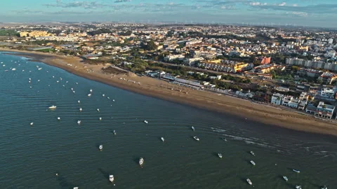 Drone captured sunset over Sanlucar de Barrameda, Andalusia. Spain. Stock Footage 262098654