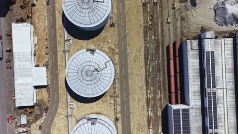 Drone captured vast industrial complex with tanks and pipelines. Overhead Stock Footage 337909188