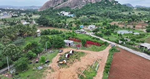 A drone captured a view of a tourist bus spotted at Ramanagara Hill during .. Video stock 325950775