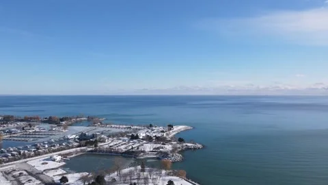 Drone Captures Amazing View of a Harbor in a Snowy Landscape Stock Footage 296203343