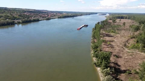 Drone captures a barge sailing on Danube river in Serbia Stock Footage 269540213