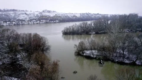 Drone captures Bega river merging with Tisza in Titel, Serbia in winter Video stock 263359332