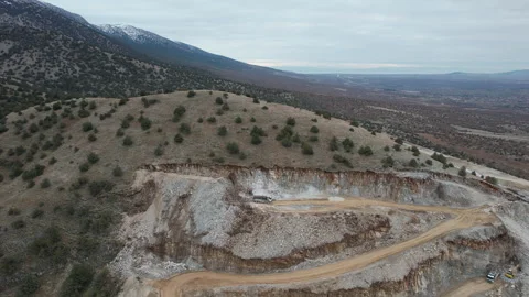 A drone captures a construction site in a mountainous area 스톡 동영상 317946257