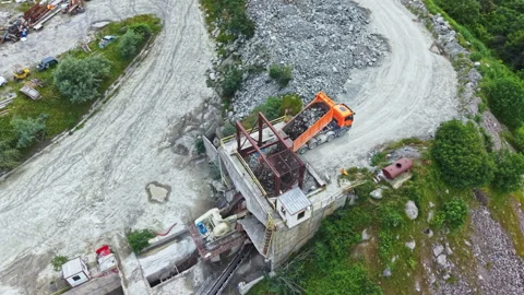 Drone captures excavation scene. Unmanned aerial vehicle documents dig and Stock Footage 337887873