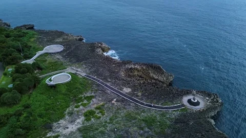Drone Captures Expansive Coastal Platform System Amidst Rocky Shoreline Stock Footage 324702226