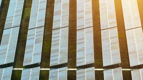 The drone captures an expansive field of solar panels. Stock Footage 306140132