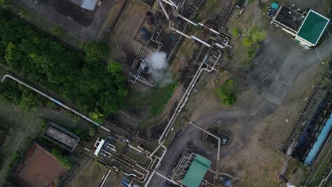 Drone captures extensive piping networks of a geothermal power plant. Stock Footage 336796109