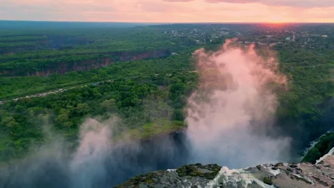 Drone Captures Fog Over Precipice and waterfall. Aerial Footage Of Morning Fog Stock-Footage 338361059
