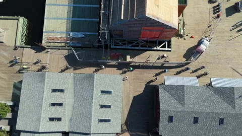 Drone Captures Group Cycling Through Halifax Coastal Streets On Sunny Morning Stock Footage 328318052