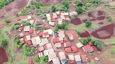 Drone captures a hill station hamlet tucked among trees Stock Footage 311622333