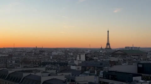Drone captures illuminated rooftops over Paris metropolis Stock Footage 337184656