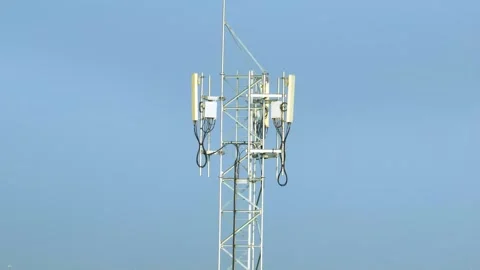 The drone captures the intricate design of a communication tower. Stock Footage 306140763