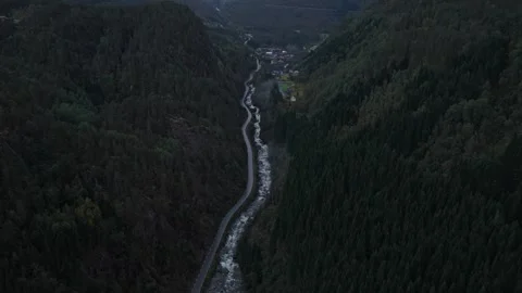 Drone captures Latefossen Waterfall across rugged Norway highlands Stock Footage 320244625