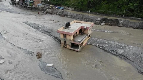 Drone captures massive flood damage in Nepal's Melamchi Bazaar, worsened by Stock Footage 312335331
