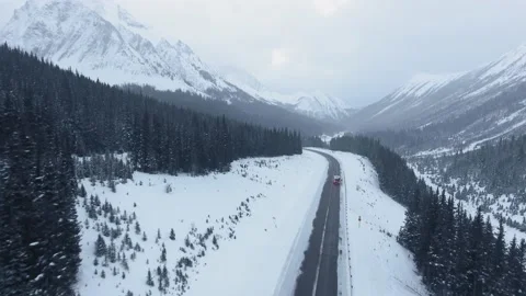 Drone captures midwinter trailer journey in Kananaskis, Alberta, Canada Stock-Footage 143235019