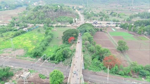 Drone Captures Overpass Stretching Above Railway Line Stock Footage 311621915