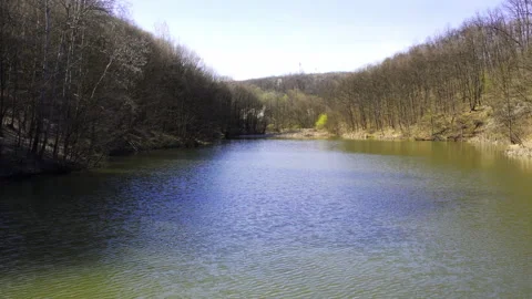 Drone captures rippling lake surface as it flies just above it Stock-Footage 261862528