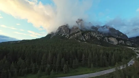 Drone Captures Rugged Mountain Landscape, Aerial View Of Mountains As Sun Sets Видео 325825125