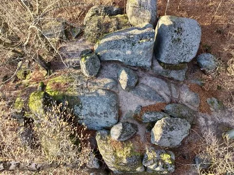 Drone Captures Rugged Stone Terrain, Clustering Of Rocks Showcases Steep To.. Stock Photos