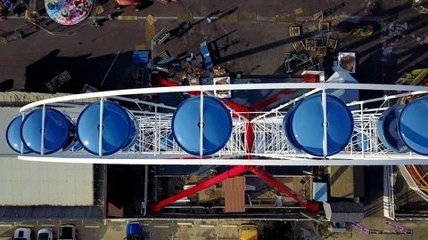 Drone captures running ferris wheel on the Ocean City Pier cam straight down Stock Footage 89450121