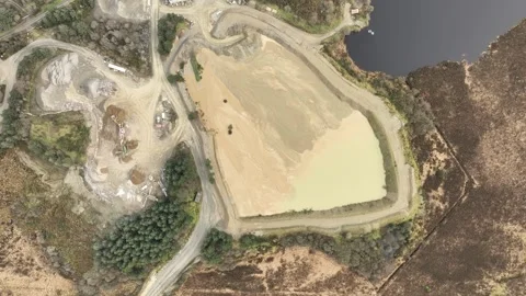 Drone captures sand quarry at work in ireland Stock Footage 334958656